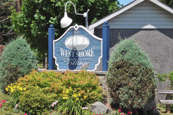 West Shore Village Sign at Entrance